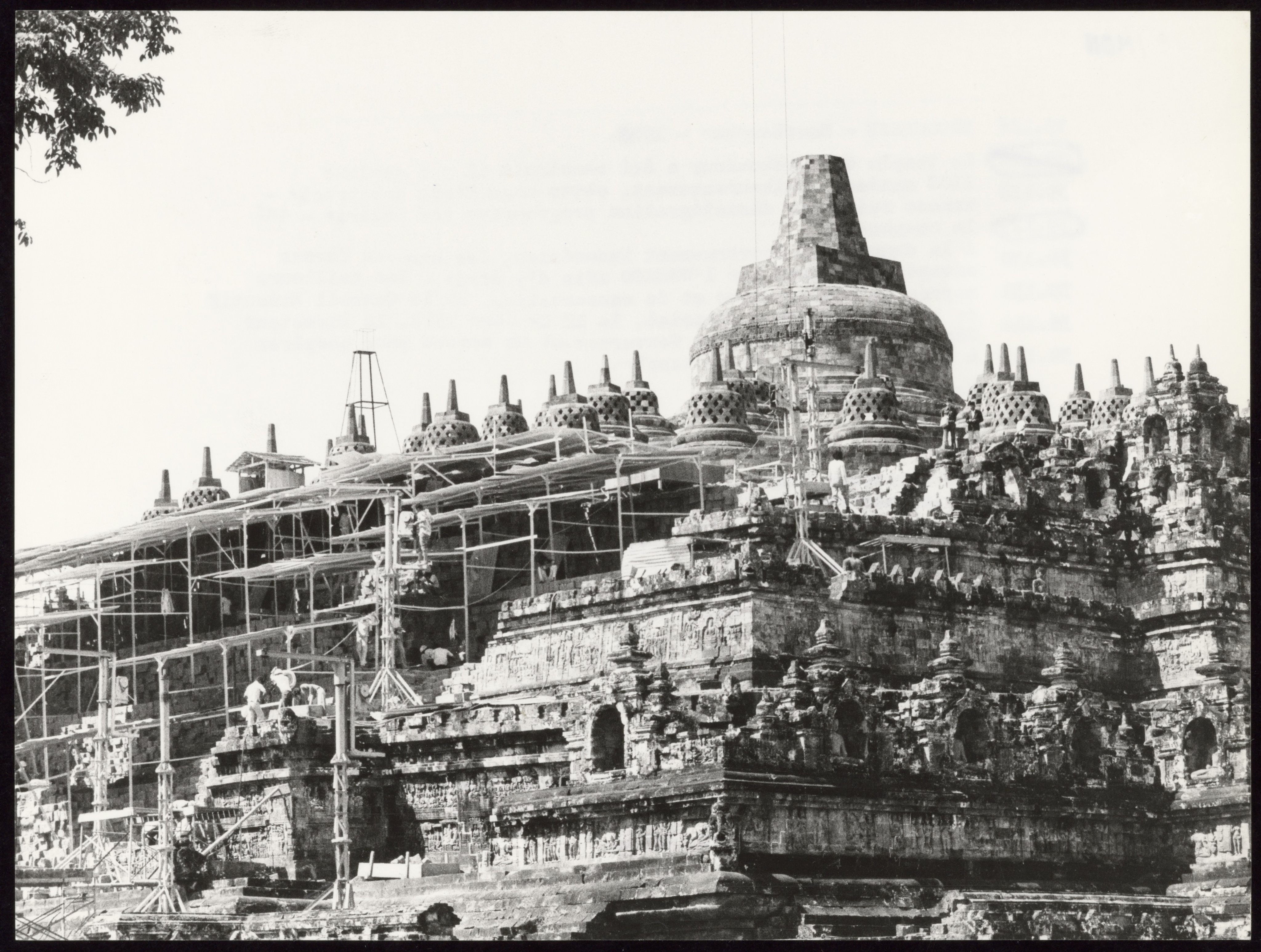 Restoration workers rebuilding the stone structure of Borobudur between 1973 and 1983