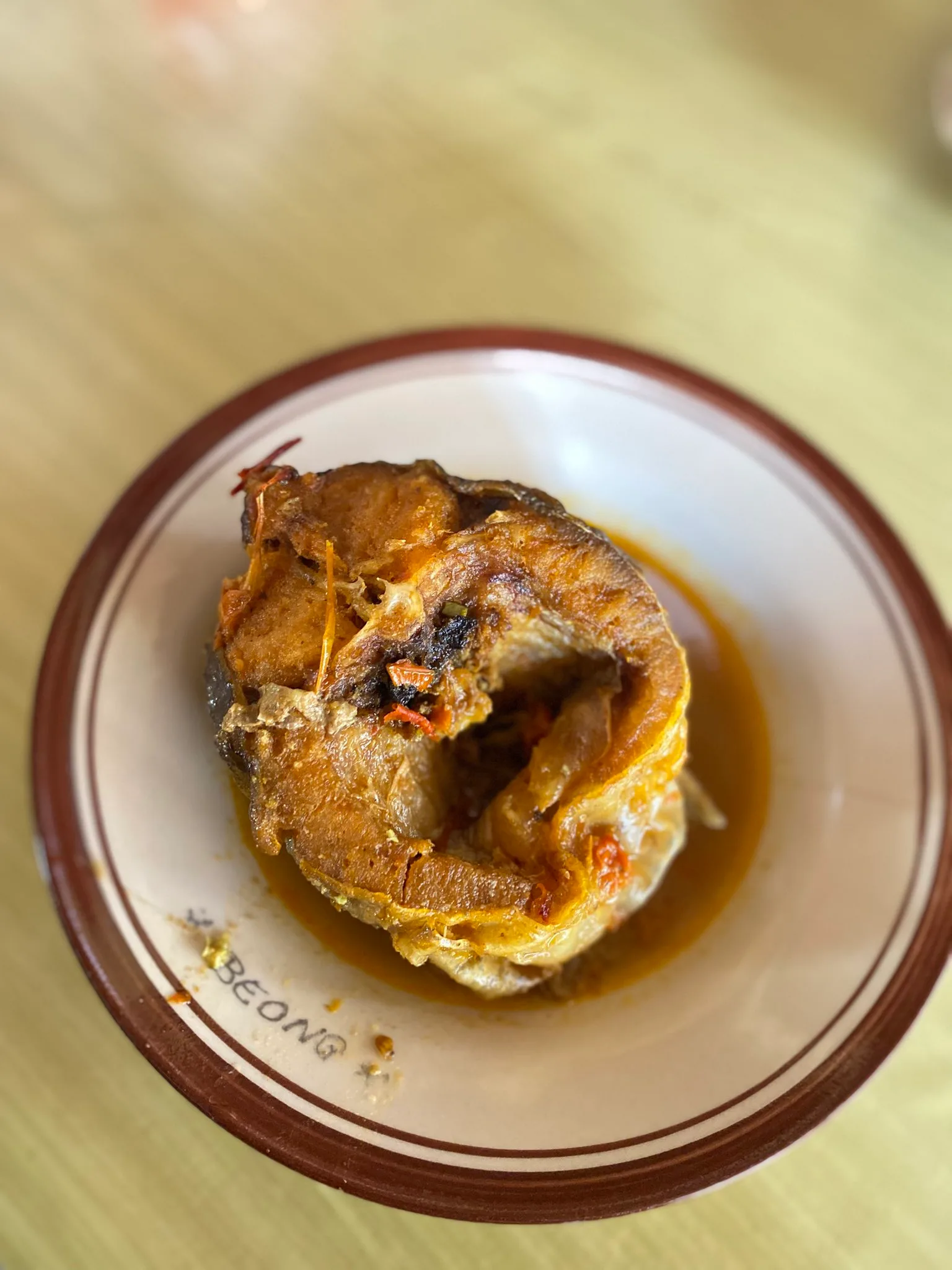 A plate of Mangut Beong, a spicy coconut-milk river-fish dish from near Borobudur