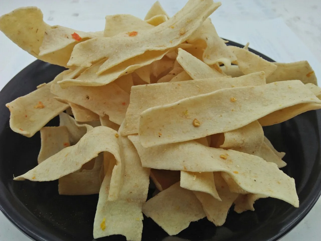 Cassava chips and snacks known as Slondok and Puyur