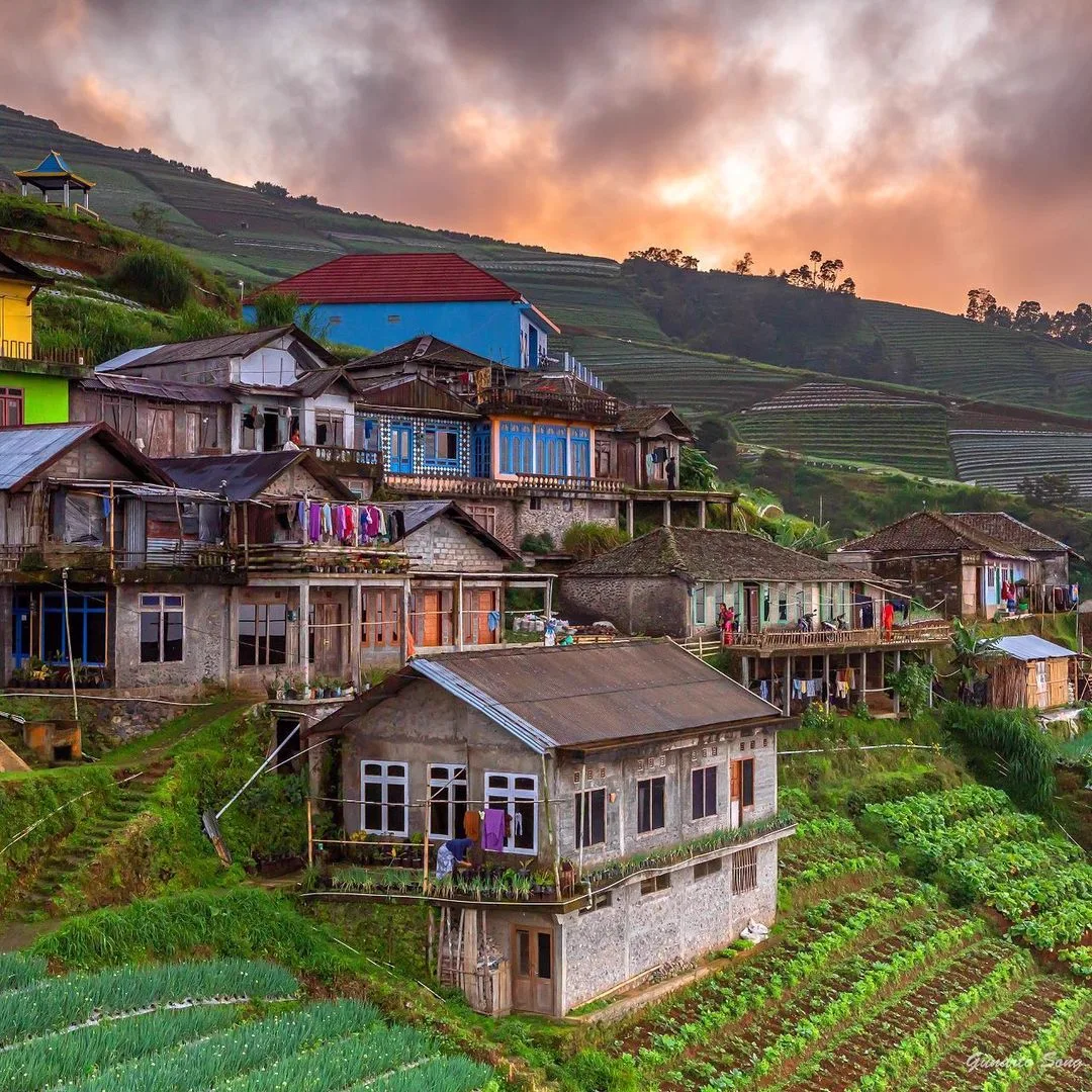 A square within the village of Dusun Butuh surrounded by planted terraces