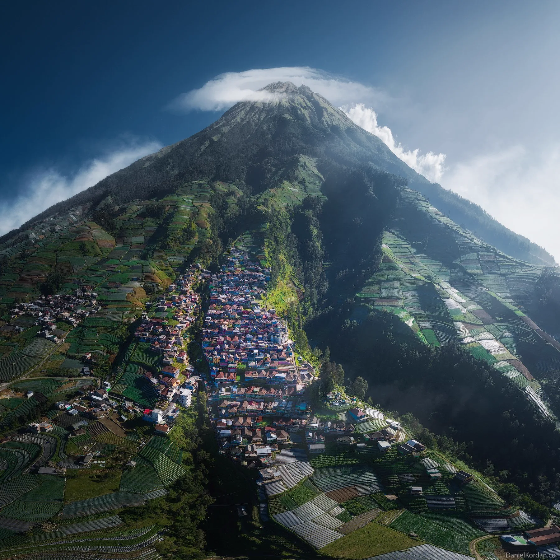 A hillside village square at Nepal Van Java in Dusun Butuh, with layered terraces