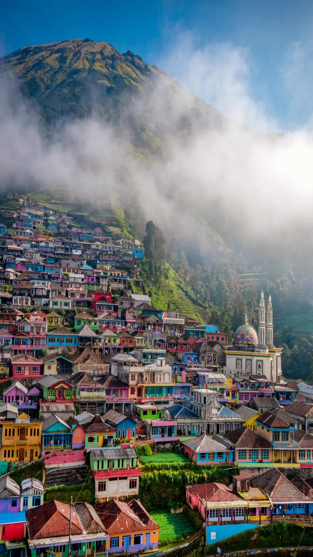 Mobile wallpaper of the tallest viewpoint over Nepal Van Java showing village and valley